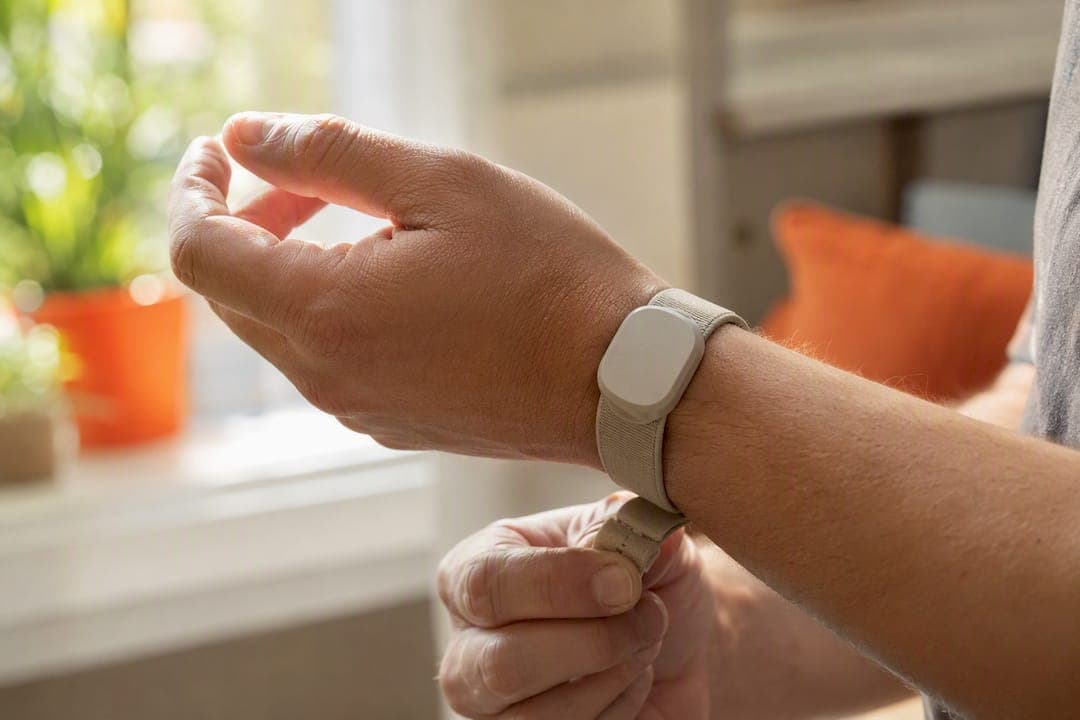 Person fastening medical wearable device