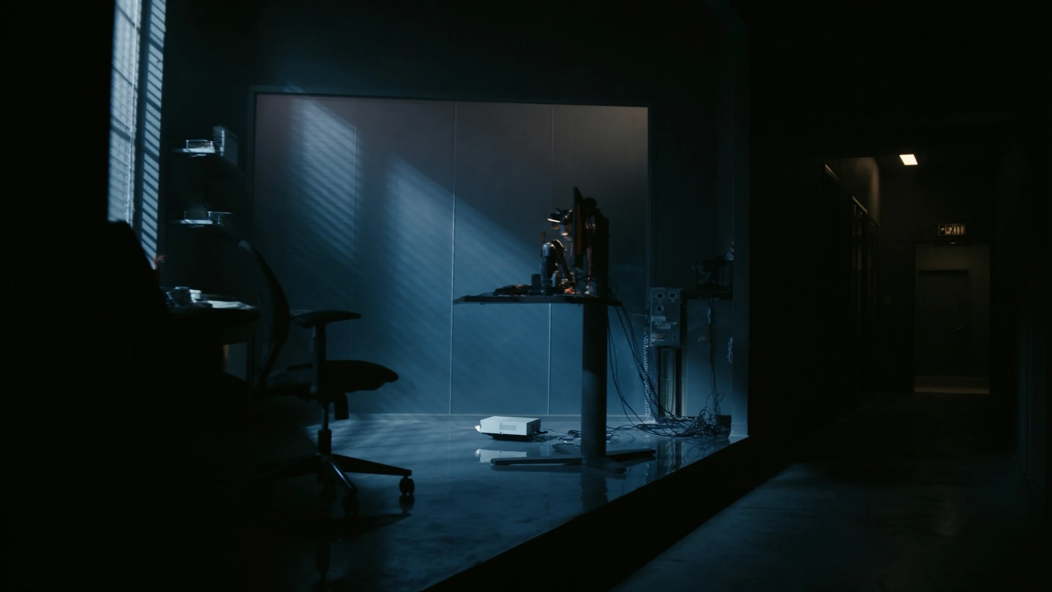 Night executive desk in an automotive operations wing, the office after the meeting