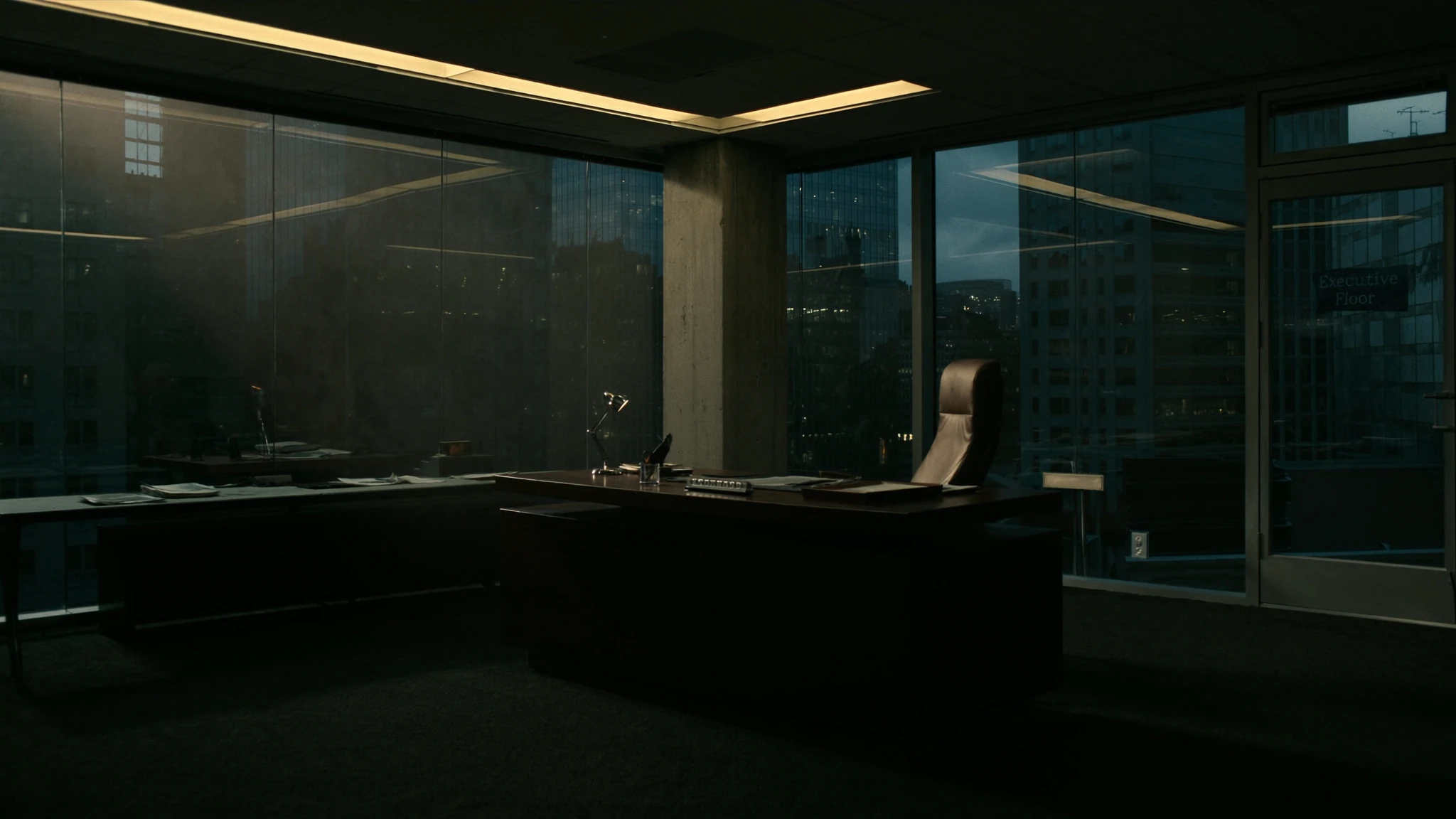After-hours corridor in a law firm, a single chair outside the rooms where the AI function is decided
